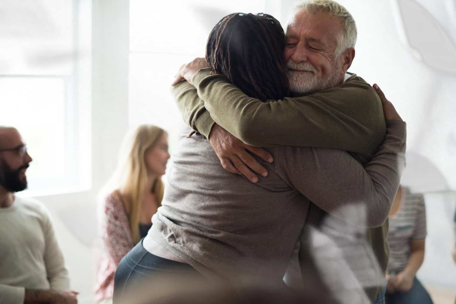 People embracing in a supportive hug during dual diagnosis treatment at Redstone Behavioral Healthin Bowling Green, KY.