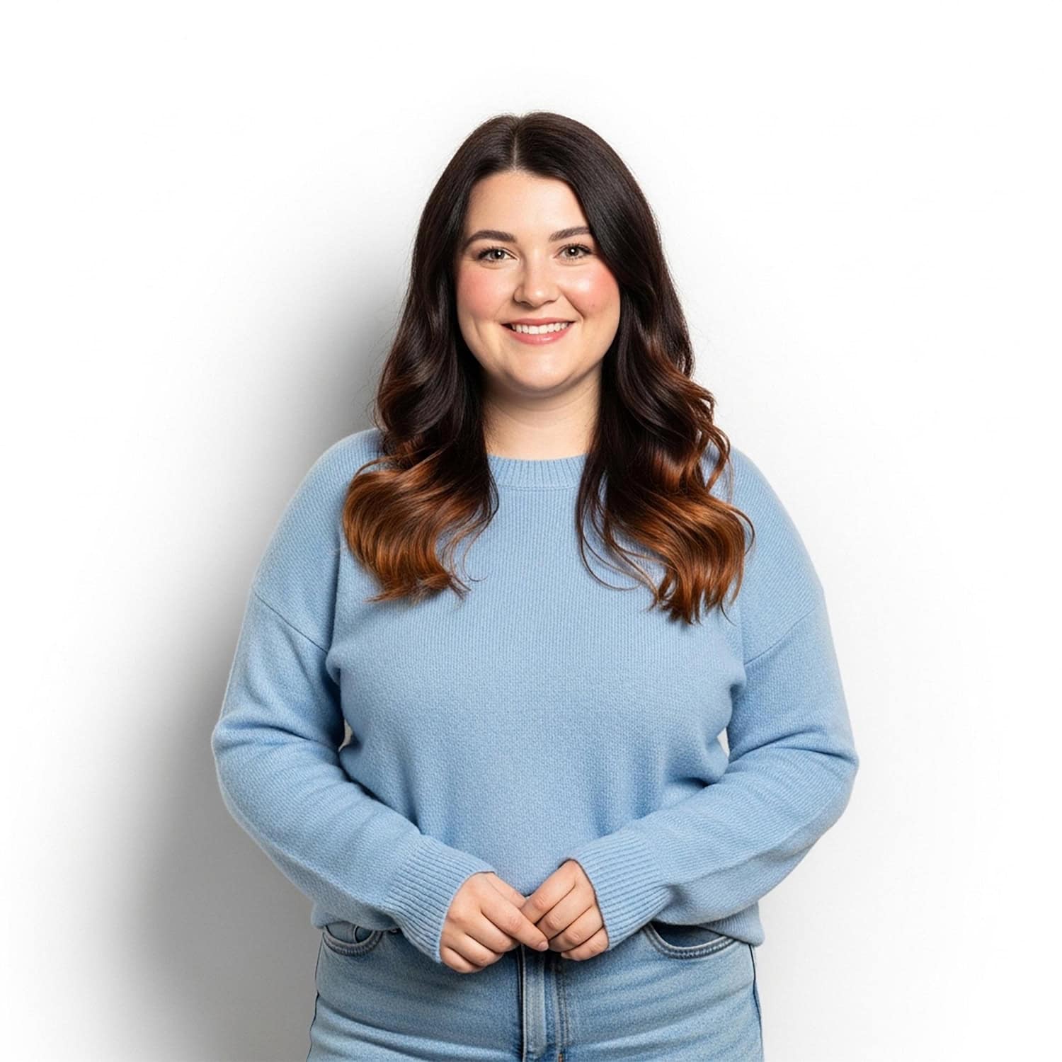 Smiling woman in blue sweater representing mental health support.